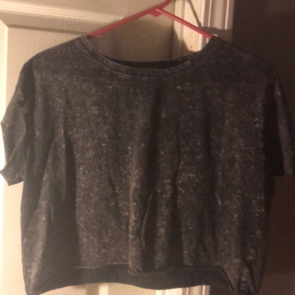 Cropped, black and white spotted shirt